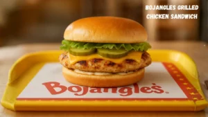 A Bojangles Grilled Chicken Sandwich served on a tray, showcasing a juicy chicken fillet nestled in a bun.